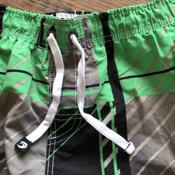 B. Split men’s swim shorts - Picture 4 of 11
